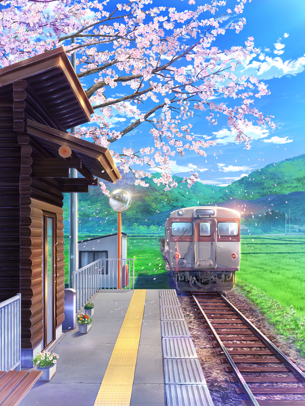 bench blue_sky building cherry_blossoms cloud day door english_commentary field grass ground_vehicle highres landscape mirror mountainous_horizon no_humans original outdoors plant potted_plant railing railroad_tracks sabishiiyoru scenery shed sky spring_(season) train train_station train_station_platform tree_branch utility_pole window