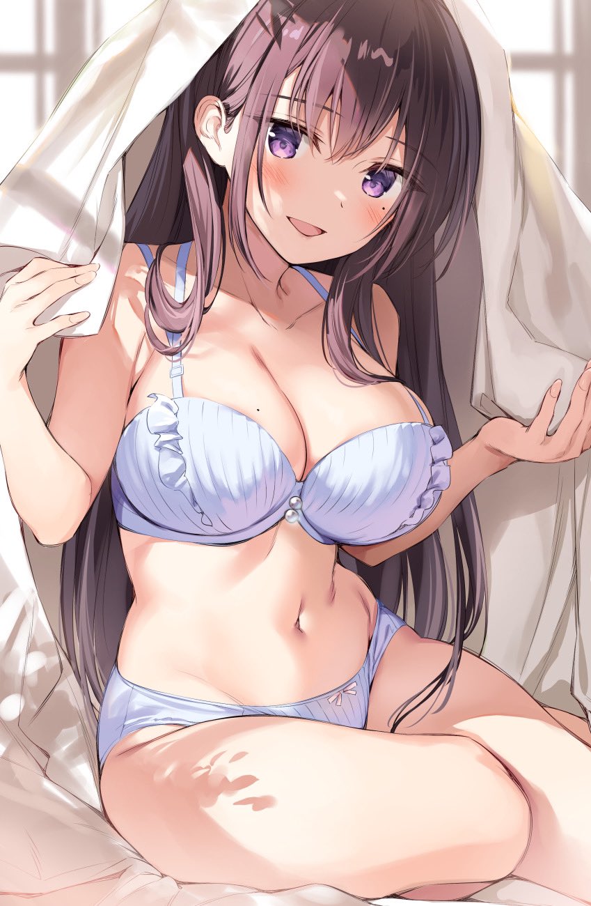 1girl bare_arms bare_shoulders black_hair blanket blue_bra blue_panties bra breasts cleavage collarbone frilled_bra frills highres large_breasts lingerie long_hair looking_at_viewer mole mole_on_breast mole_under_eye navel open_mouth original oryou panties purple_eyes sitting smile solo stomach thighs under_covers underwear underwear_only yokozuwari