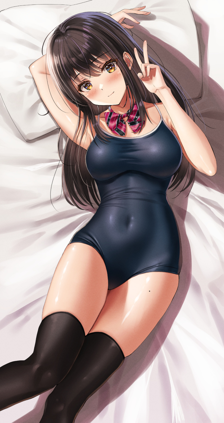1girl arm_behind_head black_hair black_one-piece_swimsuit black_thighhighs blush bow bowtie breasts brown_eyes commentary_request competition_school_swimsuit covered_navel feet_out_of_frame highres long_hair lying medium_breasts one-piece_swimsuit original pillow red_bow red_bowtie school_swimsuit smile solo striped striped_bow striped_bowtie swimsuit thighhighs yukemuriganmo