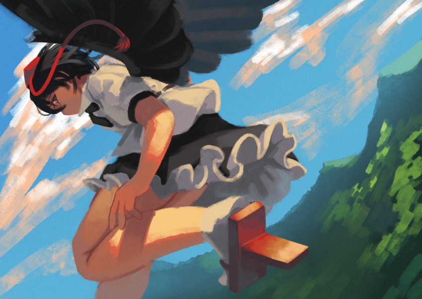 1girl bangs bird_wings black_hair black_skirt black_wings commentary flying frilled_skirt frills fujimi_nao geta hat highres looking_at_viewer mountainous_horizon red_eyes red_headwear ribbon-trimmed_shirt shameimaru_aya shirt short_hair short_sleeves sideways_glance skirt socks solo tokin_hat touhou white_legwear white_shirt wings