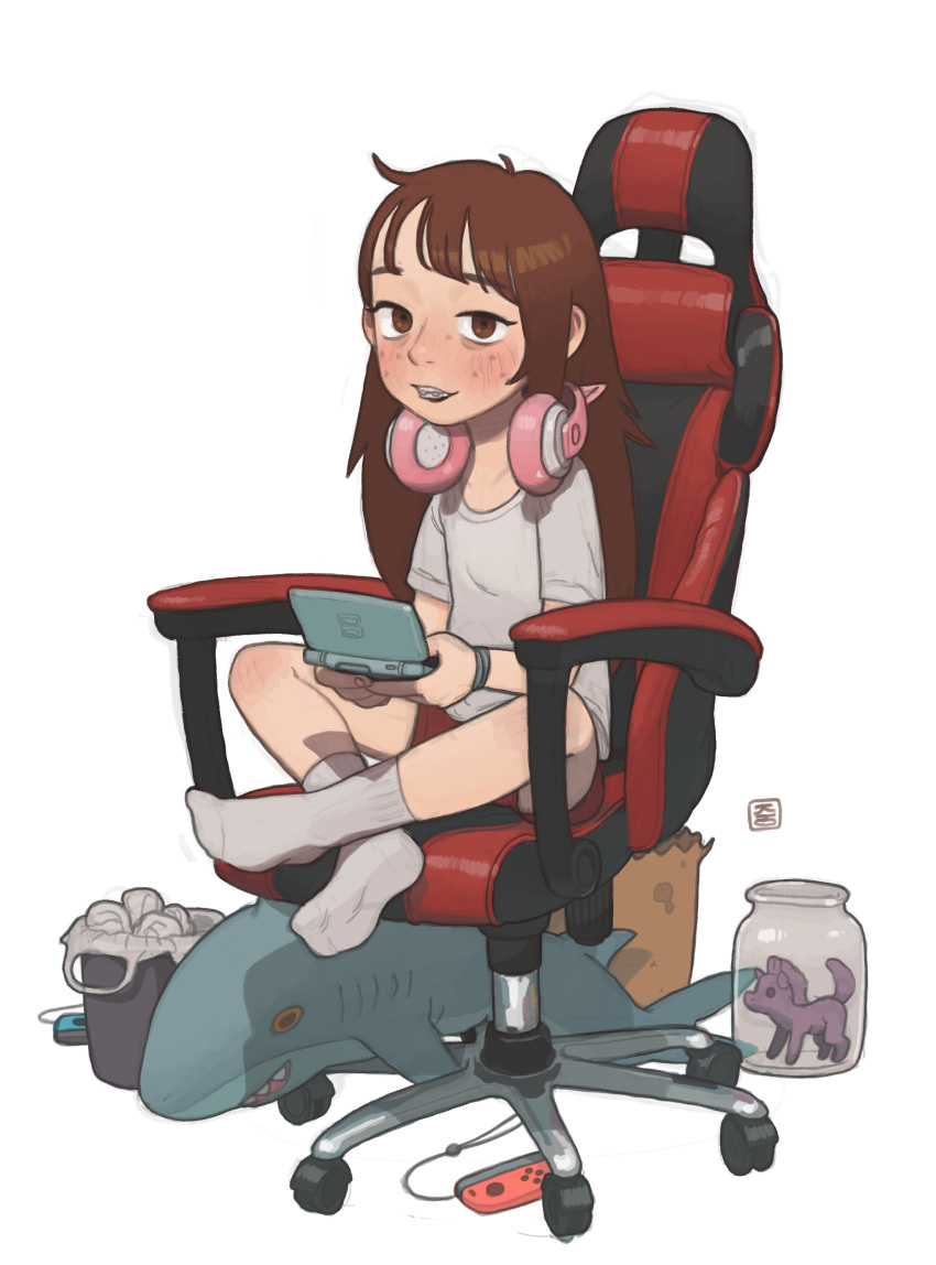 1girl absurdres bangs blush borrowed_character braces chair child crossed_legs freckles gaming_chair handheld_game_console headphones headphones_around_neck highres jar joy-con kara_(hitsuji) long_hair looking_at_viewer nintendo_3ds open_mouth opossumachine original shirt short_shorts shorts sitting smile solo stuffed_animal stuffed_shark stuffed_toy t-shirt toy trash_can white_background younger