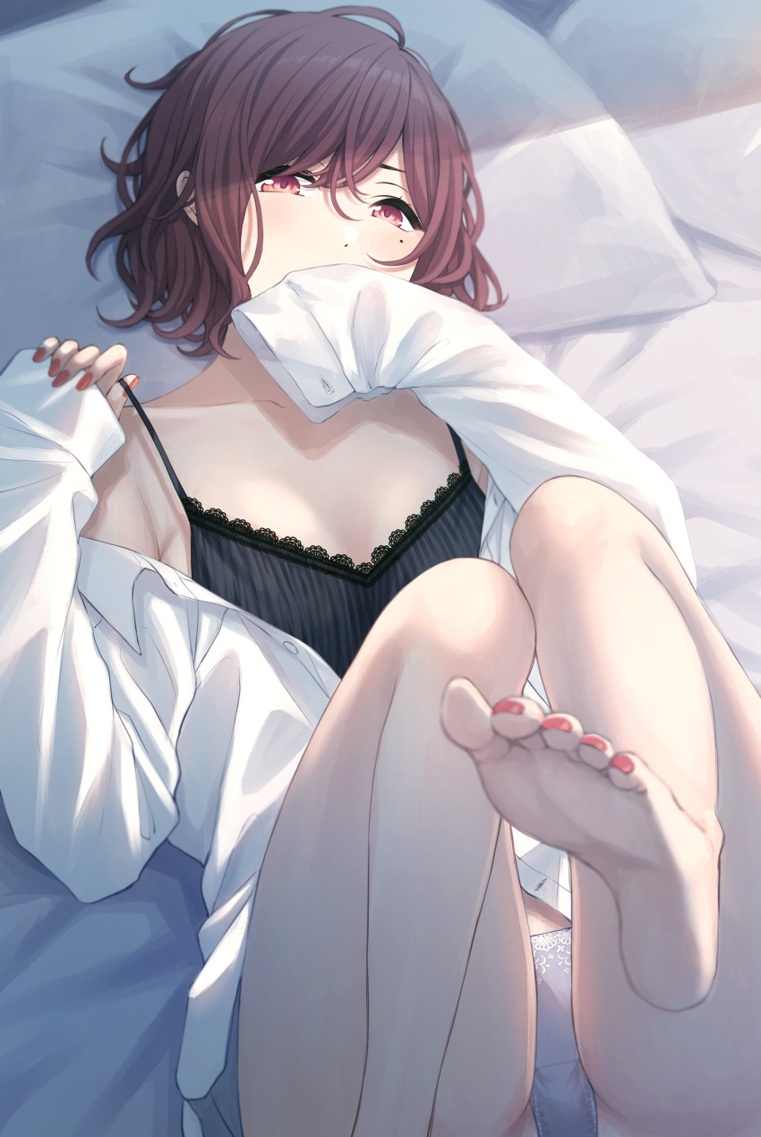 1girl absurdres ae_iueo bed_sheet black_camisole borrowed_garments camisole collarbone covered_mouth grey_panties highres higuchi_madoka idolmaster idolmaster_shiny_colors leg_up looking_at_viewer lying mole mole_under_eye nail_polish on_back on_bed oversized_clothes oversized_shirt panties red_eyes red_hair shirt sleeves_past_wrists solo underwear white_shirt