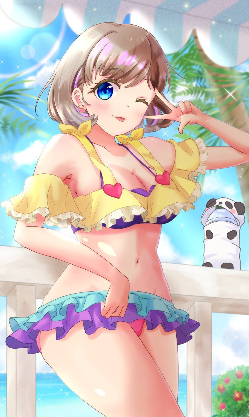 1girl ;p absurdres adapted_costume awning bangs bikini bikini_skirt blue_eyes bottle bottle_cover breasts brown_hair cleavage colored_eyelashes commentary day flipped_hair highres layered_bikini leaning_on_rail lens_flare light_brown_hair love_live! love_live!_superstar!! medium_breasts microskirt multicolored_bikini multicolored_clothes navel off_shoulder one_eye_closed outdoors palm_tree railing ritaso short_hair sidelighting skirt solo swept_bangs swimsuit tang_keke tongue tongue_out tree v_over_eye water_bottle wooden_railing yellow_bikini
