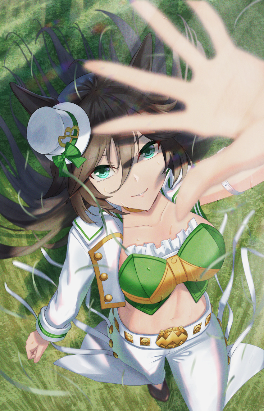 1girl absurdres animal_ears answering arm_strap arm_up black_footwear black_hair bow breasts collarbone commentary crop_top foreshortening grass green_bow green_eyes green_shirt hat hat_bow highres horse_ears jacket large_breasts long_hair long_sleeves looking_at_viewer midriff mini_hat mini_top_hat mr._c.b._(umamusume) navel open_clothes open_jacket outdoors pants shadow shirt shoes single_sleeve smile solo standing stomach strapless strapless_shirt top_hat umamusume very_long_hair white_headwear white_jacket white_pants