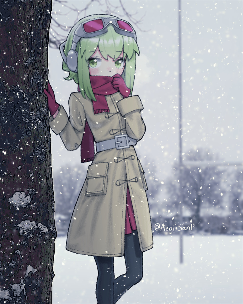 1girl aegissanp artist_name bangs blush coat covered_mouth duffel_coat gloves goggles goggles_on_head green_eyes green_hair gumi hands_up headphones highres leaning_on_object long_sleeves looking_to_the_side pantyhose photo_background pleated_skirt scarf scarf_over_mouth short_hair_with_long_locks sidelocks skirt snow snowing solo tree vocaloid winter winter_clothes