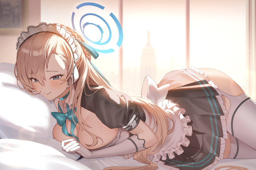 1girl absurdres apron asuna_(blue_archive) black_dress blue_archive blue_eyes breasts choker cleavage dress elbow_gloves empire_state_building frilled_apron frills gloves halo highres large_breasts light_brown_hair long_hair looking_at_viewer lying maid_apron maid_headdress mashilemo mole mole_on_breast new_york on_bed on_stomach smile solo thighhighs upper_body white_legwear