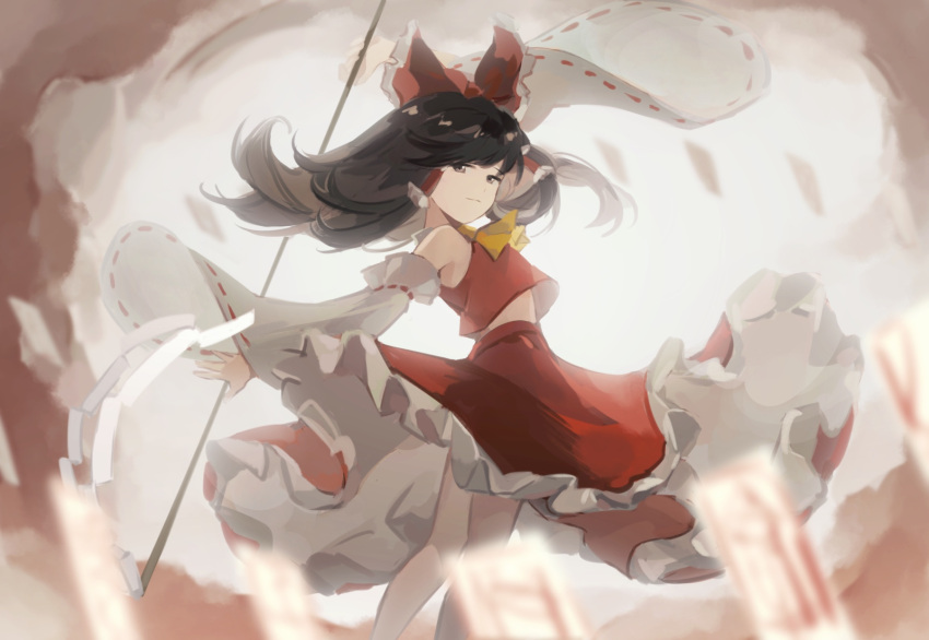 1girl arm_above_head ascot bangs bare_shoulders black_hair blurry bow breedo cloud commentary depth_of_field detached_sleeves feet_out_of_frame frilled_hair_tubes frilled_skirt frills from_side gohei grey_eyes hair_tubes hakurei_reimu highres holding_gohei long_hair looking_at_viewer ofuda red_bow red_skirt red_vest ribbon-trimmed_sleeves ribbon_trim skirt solo touhou vest white_sleeves yellow_ascot