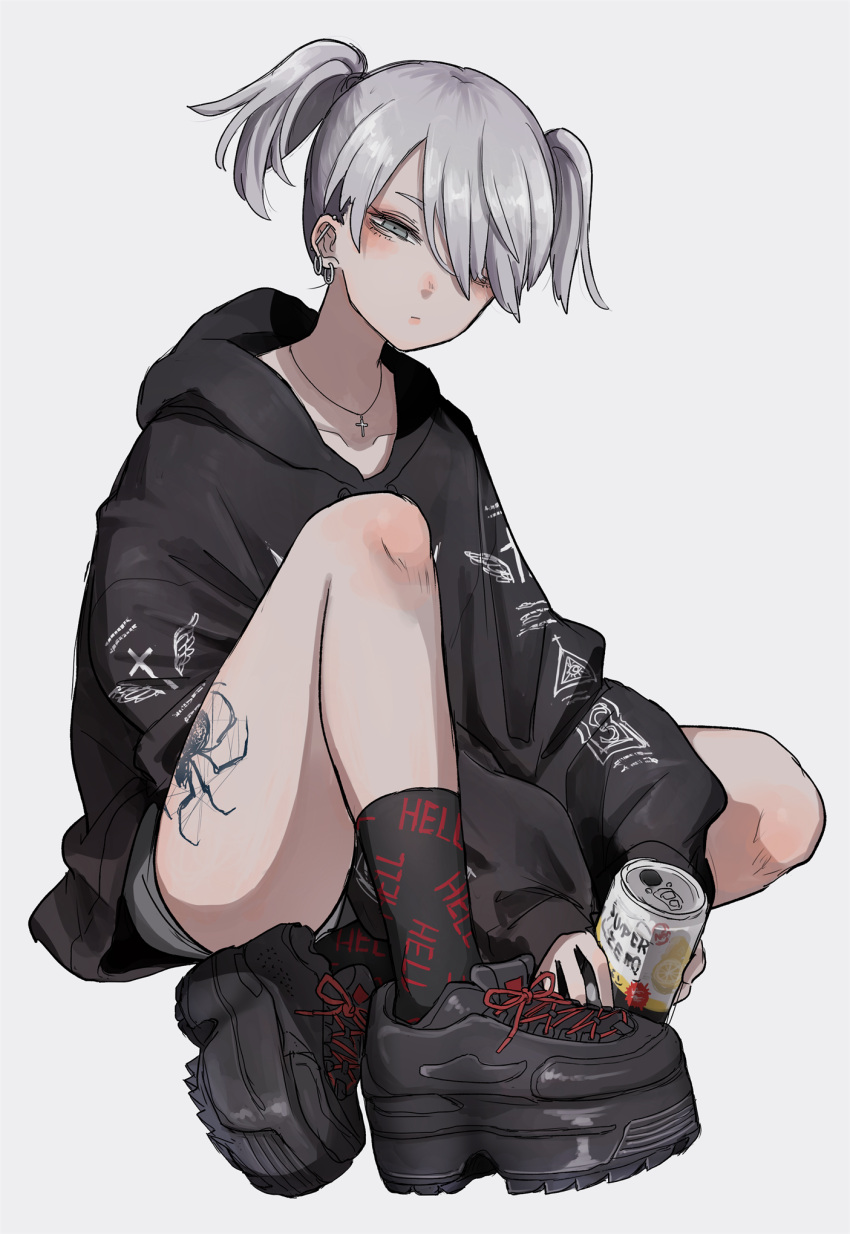 1girl baggy_clothes black_footwear black_hoodie black_legwear blush can closed_mouth clothes_writing collarbone commentary_request cross cross_necklace drawstring drink ear_piercing earrings english_text eyebrows_behind_hair grey_eyes grey_hair grey_shorts hair_over_one_eye high_heel_sneakers highres holding holding_can hood hood_down hoodie jewelry long_sleeves necklace nose_blush original piercing shoelaces shoes short_hair shorts simple_background sitting sneakers socks solo spider_tattoo squinting tabao tattoo two_side_up white_background