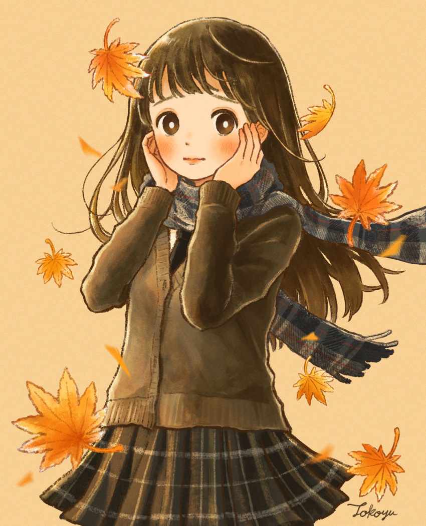 1girl autumn autumn_leaves bangs blush brown_eyes brown_hair cardigan falling_leaves frown hands_on_own_cheeks hands_on_own_face hands_up highres leaf long_hair long_sleeves looking_to_the_side maple_leaf necktie original plaid plaid_scarf plaid_skirt pleated_skirt scarf school_uniform signature skirt solo tokoyu wind