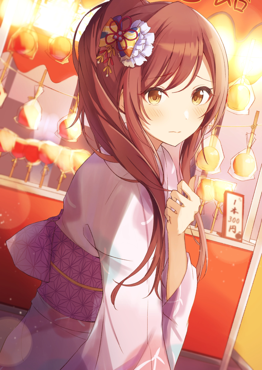 1girl alternate_hairstyle bangs blush brown_hair candy_apple clenched_hand closed_mouth festival floral_print food hair_ornament hair_over_shoulder hal_ogura highres idolmaster idolmaster_shiny_colors japanese_clothes kimono long_hair long_sleeves looking_at_viewer obi osaki_amana pink_kimono ponytail print_kimono sash solo standing summer_festival swept_bangs wide_sleeves yellow_eyes yukata