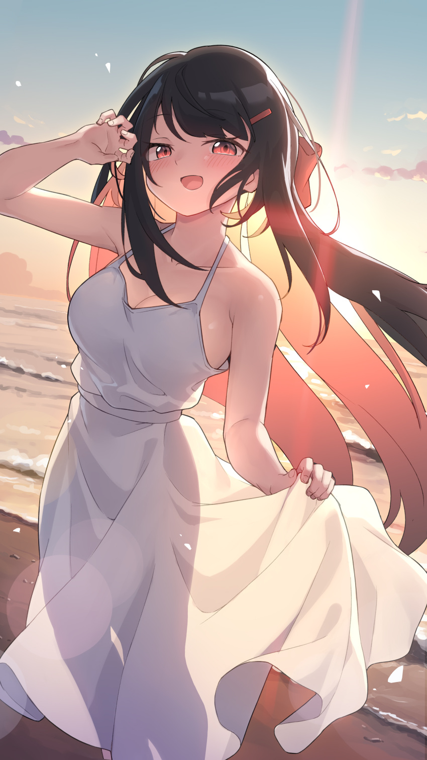 1girl absurdres arukiru backlighting bare_arms bare_shoulders beach black_hair blush breasts cleavage commentary commission dress dutch_angle evening feet_out_of_frame hair_ornament hairclip highres large_breasts long_dress looking_at_viewer ocean open_mouth original outdoors red_eyes skeb_commission skirt_hold sky sleeveless sleeveless_dress smile solo sundress sunlight sunset water white_dress