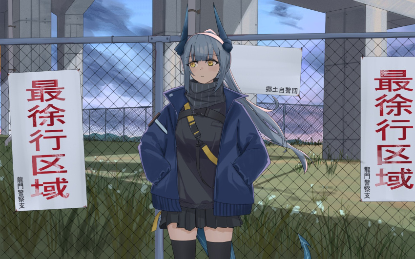 1girl :| against_fence arknights bandana bandana_around_neck black_bandana black_shirt black_skirt black_thighhighs blue_hair blue_jacket blue_sky chain-link_fence closed_mouth cloud cloudy_sky collared_jacket cowboy_shot day dot_nose dragon_girl dragon_horns dragon_tail expressionless fence floating_hair fubou_(0503oekaki24) grass hair_between_eyes hands_in_pockets high_ponytail highres horns jacket legs_apart liskarm_(arknights) long_hair long_sleeves looking_to_the_side miniskirt open_clothes open_jacket outdoors overpass pleated_skirt shadow shirt sidelocks sideways_glance sign skirt sky solo tail thighhighs translation_request yellow_eyes zettai_ryouiki