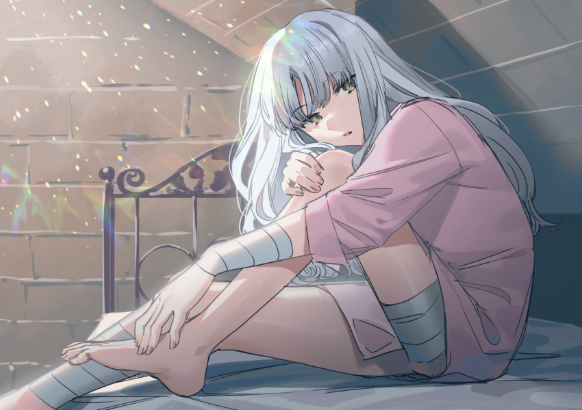 1girl bandages bangs bed breasts caren_hortensia fate/hollow_ataraxia fate_(series) long_hair looking_at_viewer medium_breasts no_pants no_shoes no_socks noko_morokoshi open_mouth pink_shirt shirt solo wavy_hair white_hair yellow_eyes