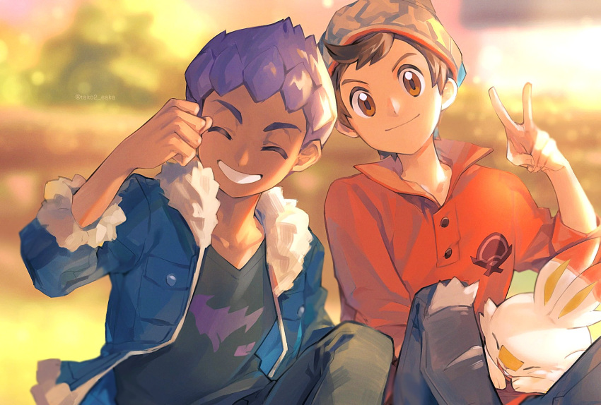 2boys bangs beanie black_pants black_shirt blue_jacket blurry blurry_background brown_eyes brown_hair cable_knit closed_eyes dark-skinned_male dark_skin day denim facing_viewer fur-trimmed_jacket fur_trim grey_headwear grin hand_up hat highres hop_(pokemon) jacket jeans looking_at_viewer male_focus multiple_boys open_clothes open_jacket outdoors pants pokemon pokemon_(creature) pokemon_(game) pokemon_swsh purple_hair scorbunny shirt short_hair sleeves_past_elbows smile swept_bangs tako2_eaka teeth torn_clothes torn_jeans torn_pants v victor_(pokemon)