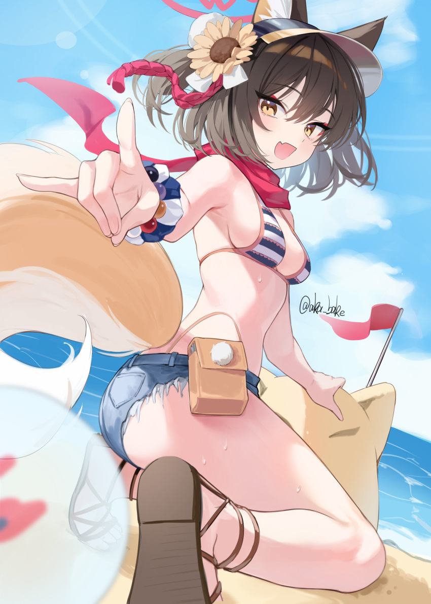 1girl aka_kan animal_ear_fluff animal_ears artist_name beach bikini blue_archive brown_hair denim denim_shorts eyeshadow fang flower fox_ears fox_girl fox_shadow_puppet fox_tail hair_flower hair_ornament halo hashtag_only_commentary highleg highleg_bikini highres izuna_(blue_archive) izuna_(swimsuit)_(blue_archive) kneeling looking_at_viewer makeup micro_shorts ocean pink_eyeshadow pink_halo pom_pom_(clothes) pom_pom_hair_ornament red_scarf scarf shorts skin_fang smile striped_bikini striped_clothes sunflower sunflower_hair_ornament swimsuit tail visor_cap