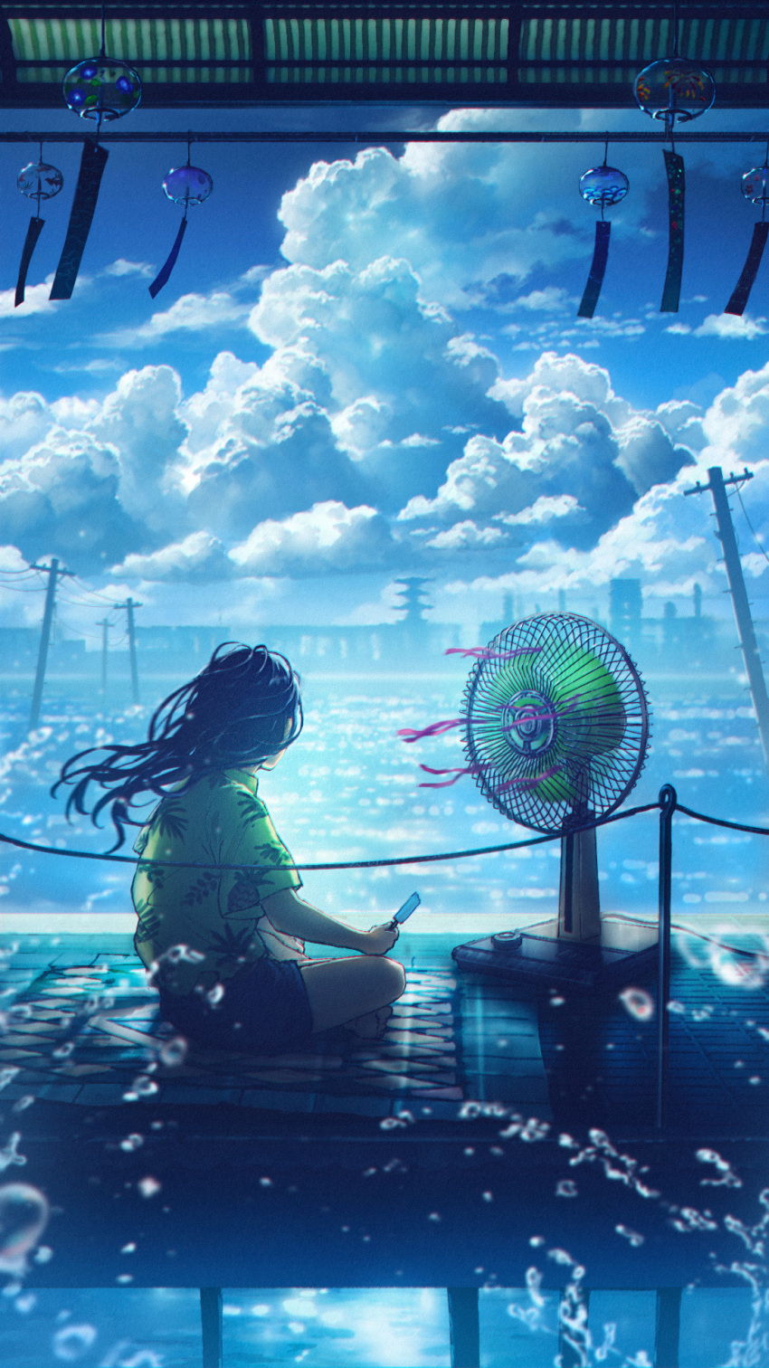 1girl bare_legs black_hair blue_shorts blue_sky blue_theme cityscape cloud commentary crossed_legs cumulonimbus_cloud electric_fan facing_away food highres holding holding_food indian_style lake medium_hair original outdoors pineapple_print popsicle scenery shirt short_sleeves shorts sitting sky solo sugi87 utility_pole water_drop wind_chime yellow_shirt