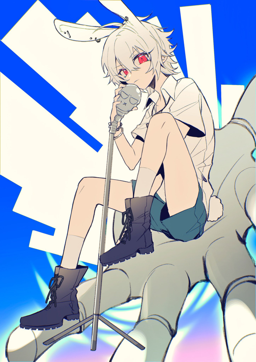 1boy animal_ears aohitsugi_samatoki black_footwear blue_background blue_shorts boots bracelet chinese_commentary closed_mouth collared_shirt commentary ear_piercing earrings full_body highres holding holding_microphone hypnosis_mic jewelry knee_up looking_at_viewer male_focus microphone microphone_stand multiple_earrings open_hand piercing rabbit_boy rabbit_ears rabbit_tail red_eyes shirt short_hair short_sleeves shorts sitting sitting_on_hand socks solo tail white_hair white_shirt white_socks yusa_(yusa0751)