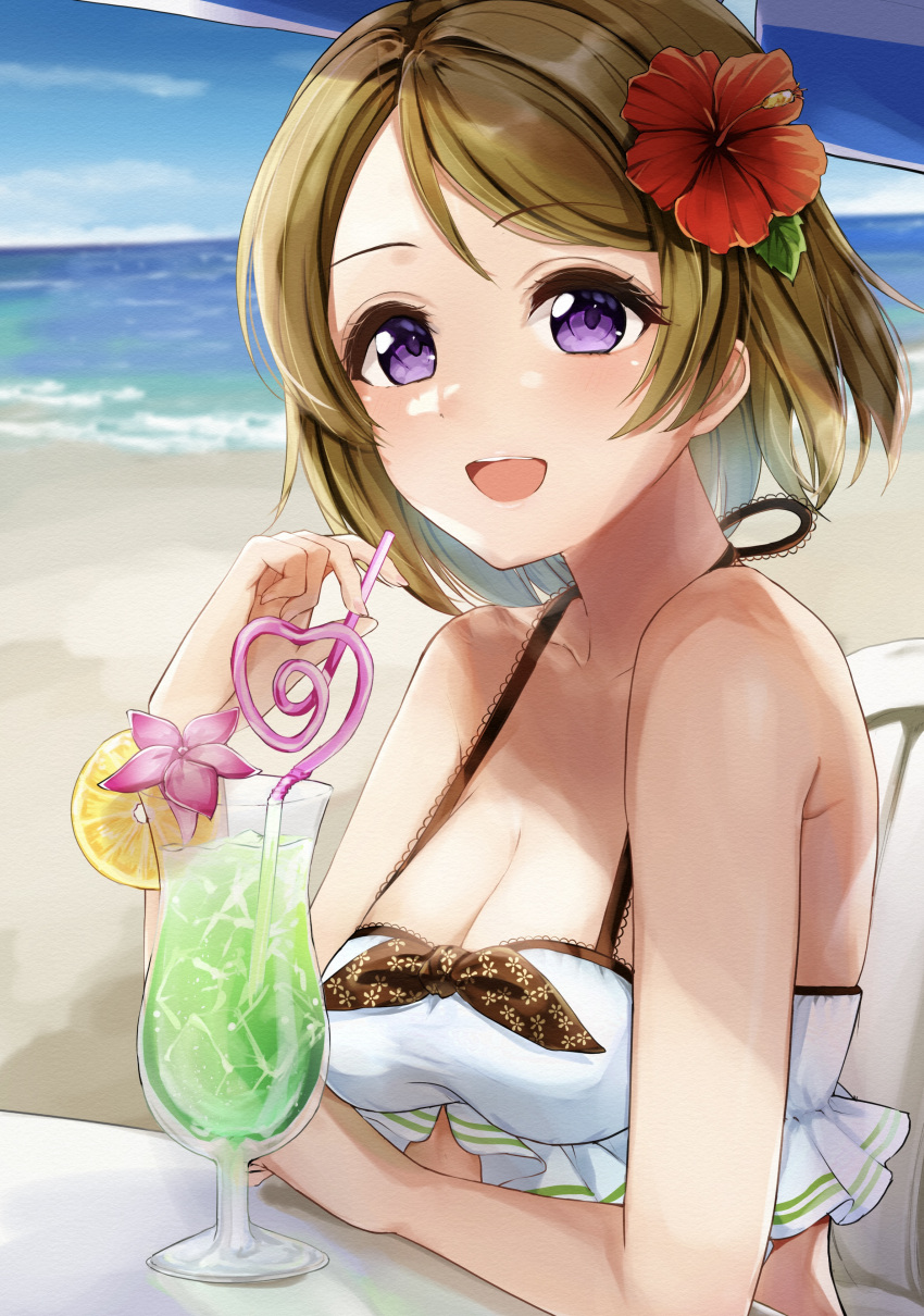 1girl :d absurdres beach beach_umbrella bikini blush breasts brown_hair cleavage commentary crazy_straw cup drinking_straw flower hair_flower hair_ornament highres koizumi_hanayo looking_at_viewer love_live! love_live!_school_idol_project medium_breasts ocean purple_eyes short_hair smile solo swimsuit symbol-only_commentary umbrella white_bikini white_swimsuit yoshinon_(yoshinon_kotori)