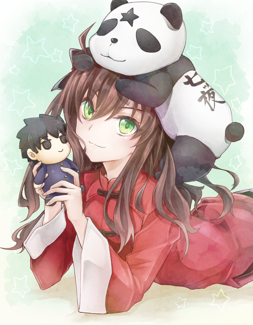 1girl animal_on_head arima_miyako brown_hair closed_mouth doll dress green_background green_eyes haruto_(haru_re26) highres holding holding_doll long_hair long_sleeves looking_at_viewer lying melty_blood on_head on_stomach panda red_dress smile tohno_shiki tsukihime