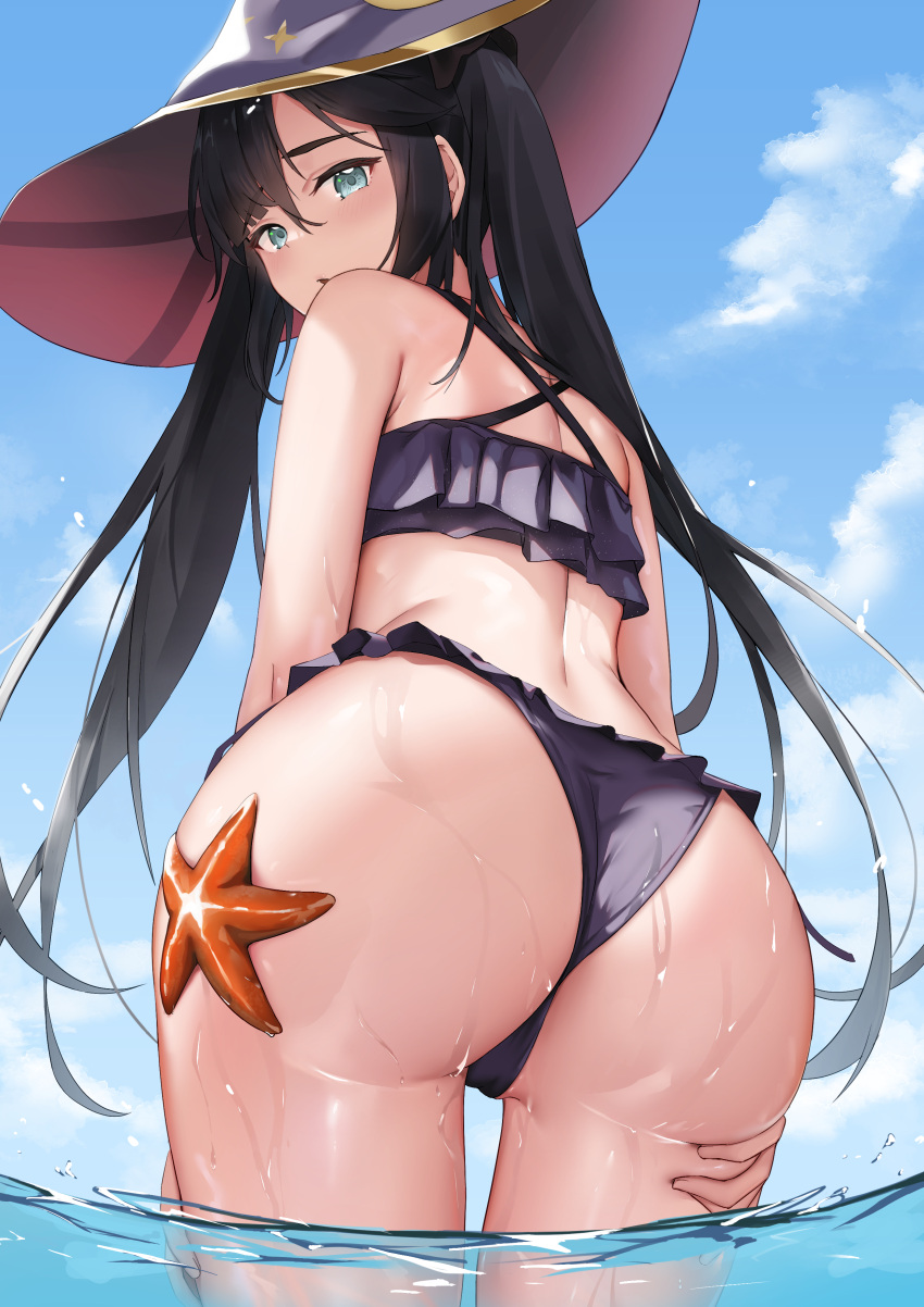 1girl absurdres alternate_costume ass ass_focus back bangs bare_arms bare_shoulders bikini black_hair blue_sky blush cameltoe cowboy_shot day frilled_bikini frills from_behind genshin_impact gold_trim green_eyes hand_on_own_thigh hat highres long_hair looking_at_viewer looking_back mona_(genshin_impact) outdoors partially_underwater_shot purple_bikini purple_headwear raised_eyebrows skai_kun sky starfish swept_bangs swimsuit thighs twintails wading water wet witch_hat