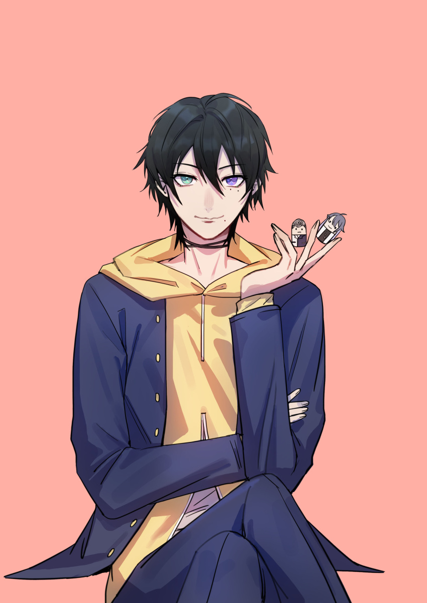 1boy absurdres black_choker black_hair black_jacket black_pants choker finger_puppet fishfall hair_between_eyes hand_on_own_arm hand_up heterochromia highres hood hood_down hoodie hypnosis_mic jacket mole mole_under_eye mole_under_mouth pants puppet short_hair simple_background sitting solo yamada_saburou yellow_hoodie