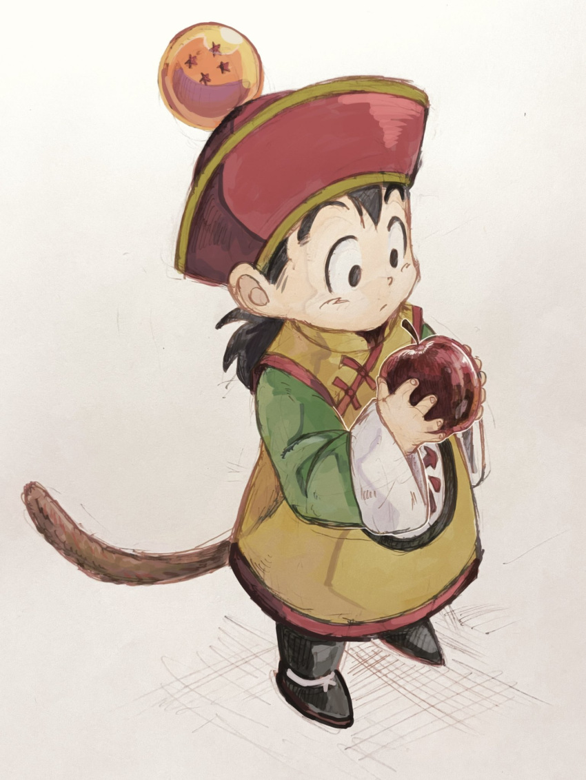 1boy apple black_eyes black_footwear black_hair child chinese_clothes closed_mouth commentary_request dragon_ball_(object) food fruit highres holding holding_food holding_fruit long_sleeves looking_at_object male_child male_focus mizuame27 monkey_boy monkey_tail red_headwear saiyan short_hair simple_background solo son_gohan tail
