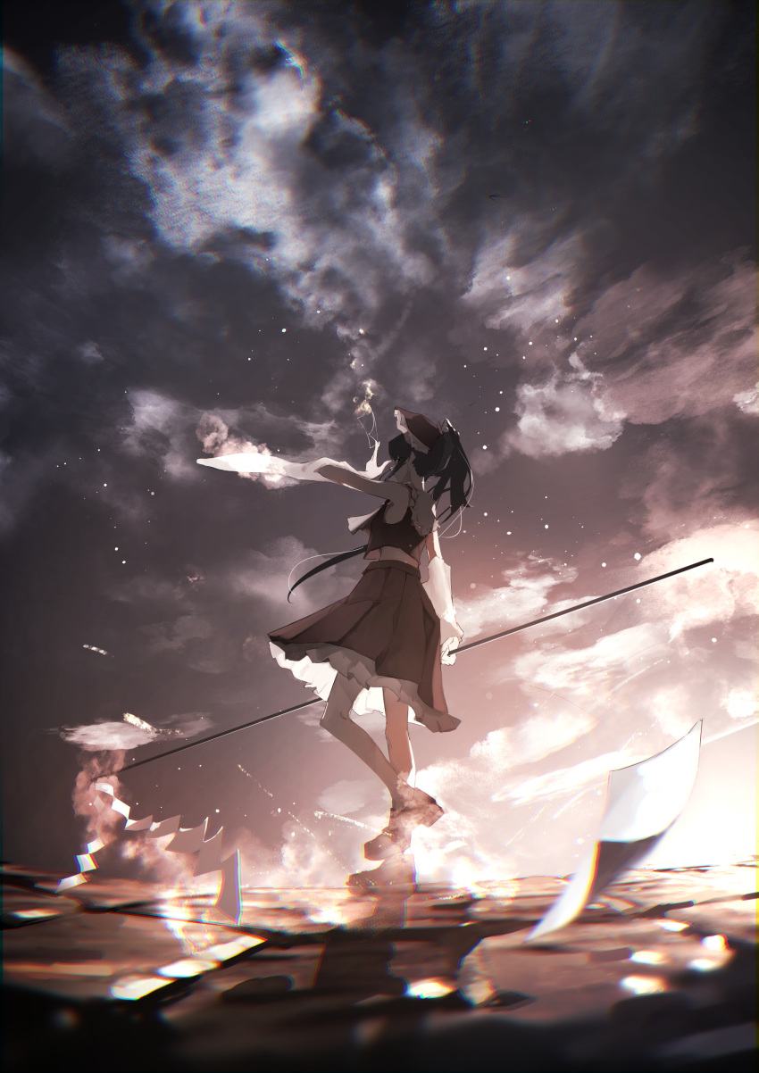 1girl absurdres aimu_(hwfdx) ascot bangs between_fingers blurry blurry_foreground bow clothes_lift cloud cloudy_sky depth_of_field detached_sleeves energy frilled_bow frilled_shirt_collar frills from_side glowing_clothes grey_sky ground_shatter hair_bow hakurei_reimu hand_up high_heels highres holding_gohei knee_up light_particles long_hair looking_at_viewer midriff petticoat pleated_skirt ponytail pumps red_bow red_shirt red_skirt scenery serious shirt shirt_lift sidelocks skirt skirt_lift sky sleeveless sleeveless_shirt solo steam talisman touhou white_sleeves wind
