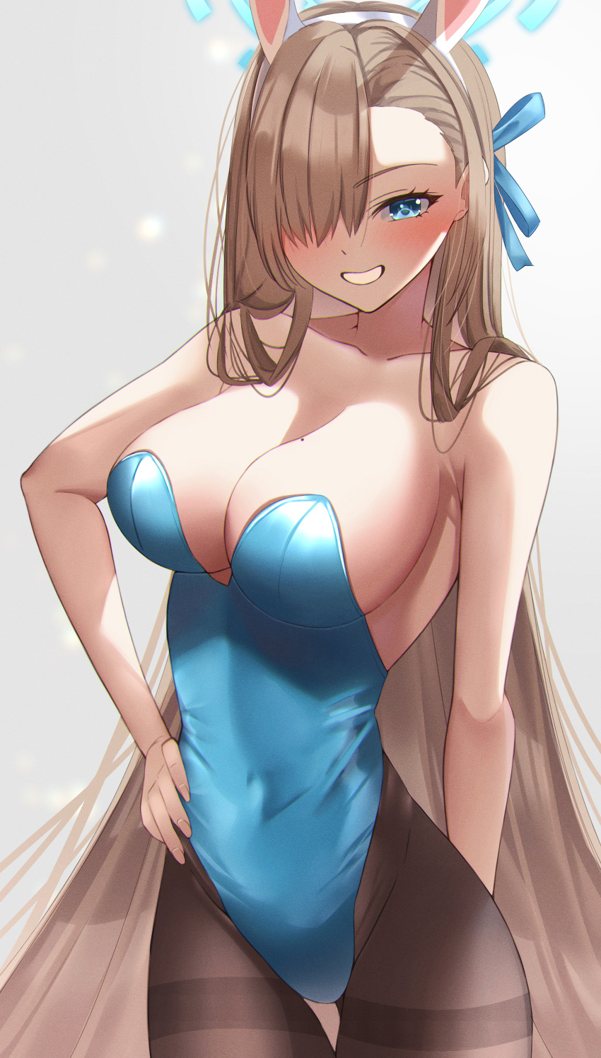 1girl absurdres animal_ears asuna_(blue_archive) asuna_(bunny)_(blue_archive) blue_archive blue_eyes blue_leotard blush breasts cleavage collarbone covered_navel fake_animal_ears gradient gradient_background grin hair_over_one_eye halo highres katagirinanoka large_breasts leotard light_brown_hair looking_at_viewer mole mole_on_breast pantyhose rabbit_ears simple_background smile solo