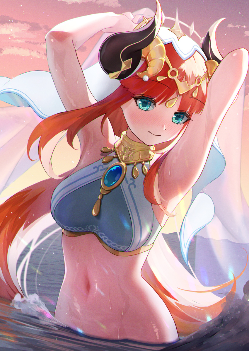 1girl armpits arms_up bangs bare_arms blush breasts brooch closed_mouth crop_top dot_nose evening forehead_jewel genshin_impact gold_choker gold_trim green_eyes highres horns jewelry long_hair looking_at_viewer low_twintails medium_breasts navel nilou_(genshin_impact) orange_sky outdoors parted_bangs partially_submerged red_hair shirt sky sleeveless smile stomach tatsunokodragon twintails upper_body veil water wet white_headdress