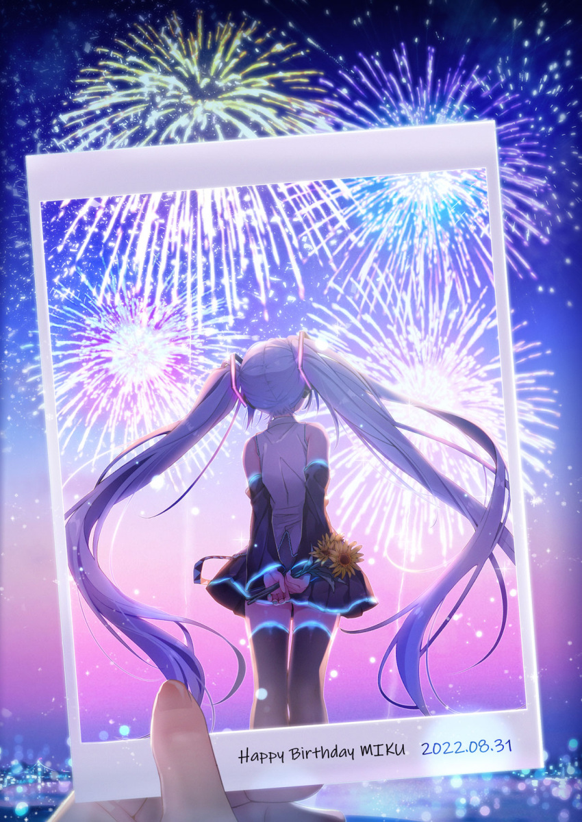 aerial_fireworks aqua_hair arms_behind_back bare_shoulders black_skirt black_sleeves black_thighhighs clear_sky commentary dated dated_commentary detached_sleeves english_commentary fireworks flower happy_birthday hatsune_miku highres holding holding_flower holding_picture legs_together long_hair looking_at_object maronie. night outdoors own_hands_together picture_(object) pleated_skirt shirt sidelocks skirt sky sleeveless sleeveless_shirt solo strap sunflower thighhighs twintails very_long_hair vocaloid white_shirt zettai_ryouiki