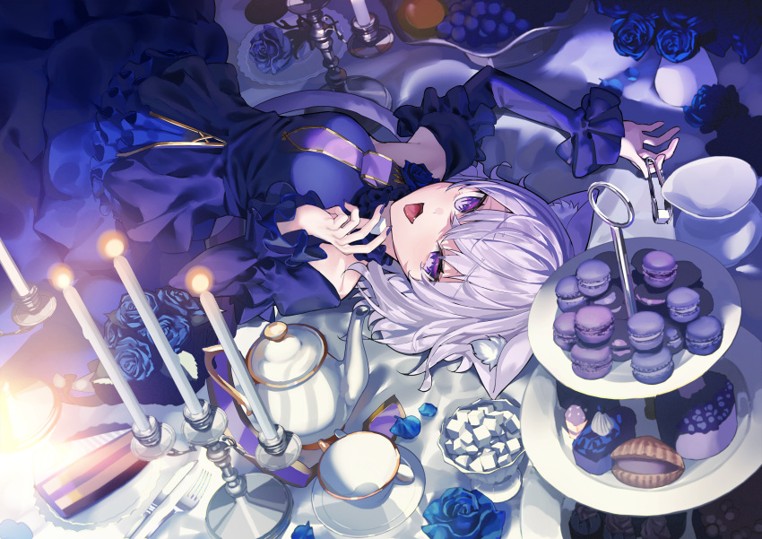 1girl absurdres animal_ears blue_dress blue_flower blue_rose cake cake_slice candelabra cat_ears cup dress flower food highres hololive lying macaron nekomata_okayu on_back on_table purple_eyes purple_hair purple_nails rose sugar_cube susukawa_(susucawa) table teacup teapot virtual_youtuber