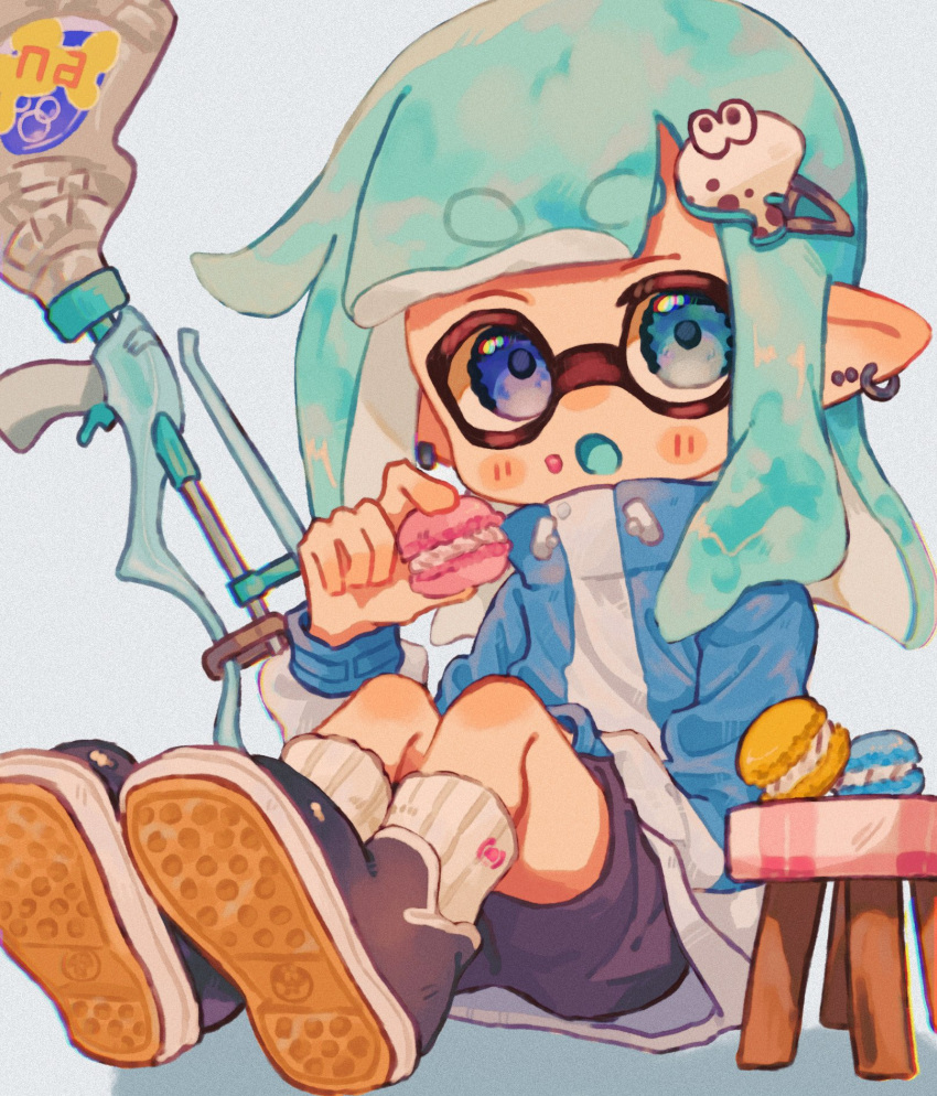 1girl :o black_shorts blue_background blue_eyes blue_hair blue_jacket commentary_request ear_piercing earrings eyebrows_hidden_by_hair food full_body gun hair_ornament hairclip heterochromia highres holding holding_food hoop_earrings inkling inkling_girl inkling_player_character jacket jewelry long_hair looking_at_viewer macaron ochocho2828 piercing pointy_ears shoes shorts simple_background sitting socks solo splatoon_(series) splatoon_3 squiffer_(splatoon) table tentacle_hair thick_eyebrows weapon white_socks