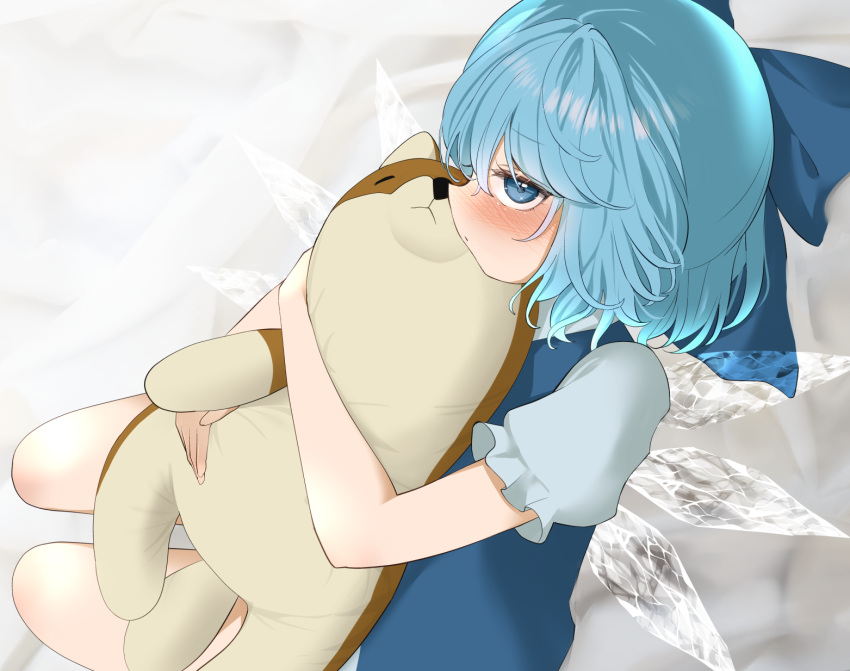 1girl bare_legs blue_bow blue_dress blue_eyes blue_hair blush bow cirno closed_mouth dress fairy hair_bow highres hugging_doll hugging_object ice ice_wings looking_at_viewer mikan_(manmarumikan) shirt short_hair short_sleeves solo stuffed_animal stuffed_dog stuffed_toy touhou white_shirt wings