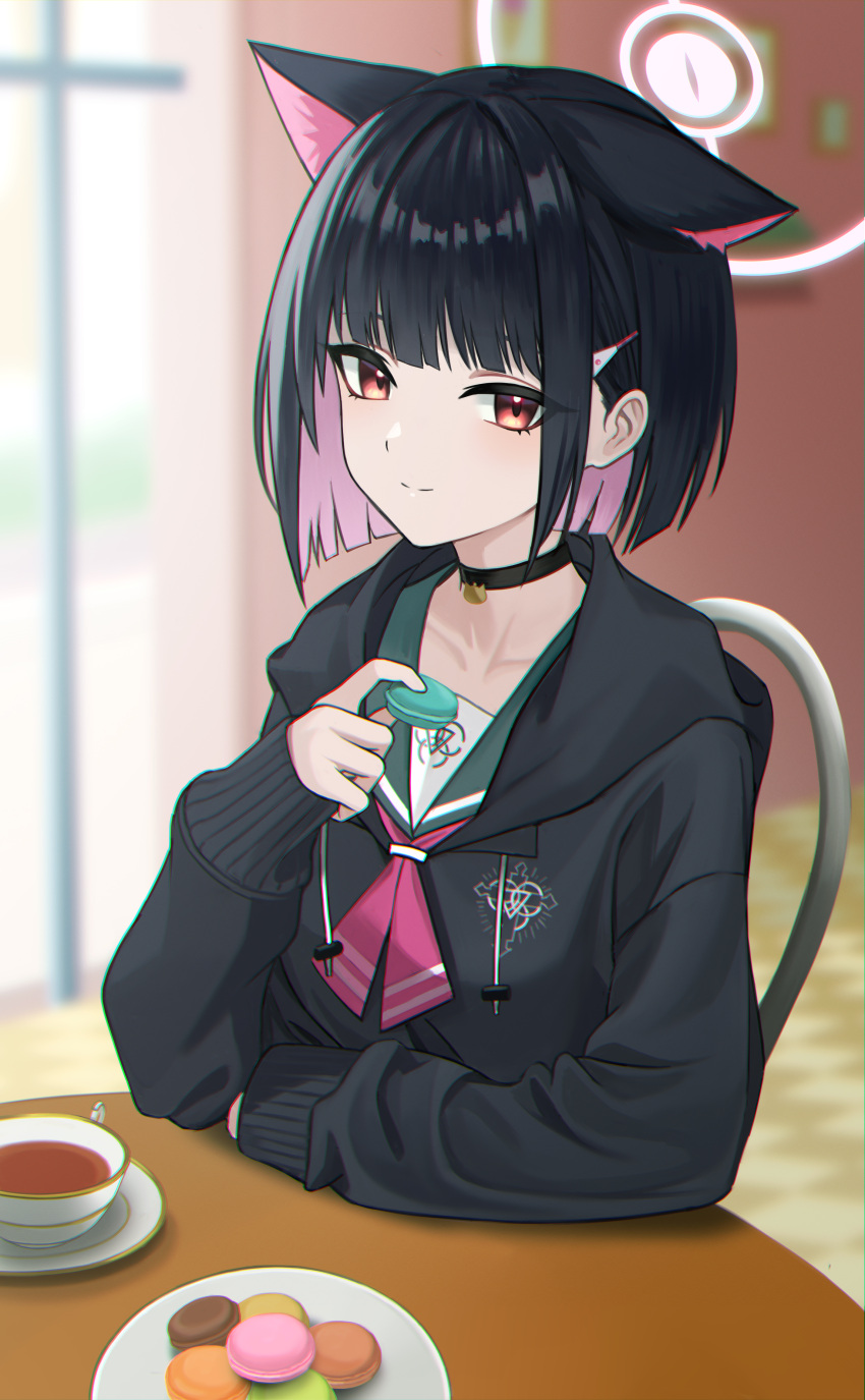 1girl absurdres animal_ears bangs black_choker black_hair black_hoodie blue_archive blunt_bangs chair choker closed_mouth collarbone colored_inner_hair cup extra_ears food halo highres holding holding_food hood hood_down hoodie indoors kazusa_(blue_archive) kit long_sleeves looking_at_viewer macaron multicolored_hair pink_hair plate red_eyes short_hair sitting sleeves_past_wrists smile solo table tea teacup upper_body