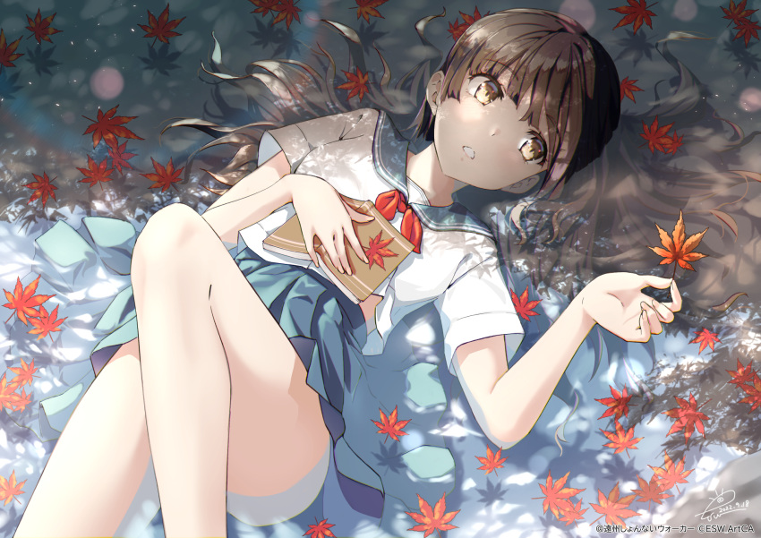 1girl autumn_leaves bare_arms bare_legs blue_sailor_collar blue_skirt book brown_eyes brown_hair facing_viewer feet_out_of_frame hair_spread_out highres holding holding_leaf knee_up leaf long_hair looking_at_viewer lying maple_leaf on_back open_book open_mouth original pleated_skirt raiz_art_works sailor_collar school_uniform serafuku shirt short_sleeves skirt solo uniform water white_shirt