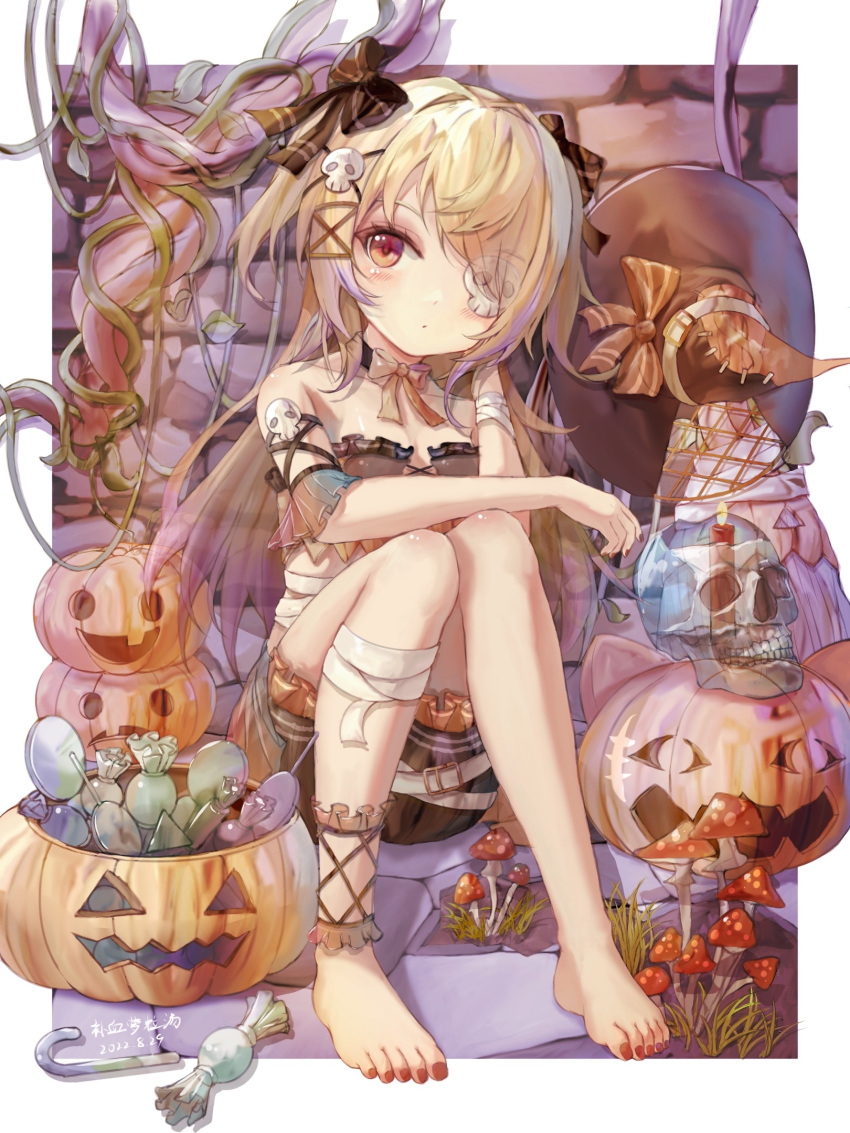1girl aged_down alternate_costume arm_on_knee bandaged_leg bandages bare_shoulders barefoot blonde_hair bloomers blush bow bowtie buxue_luo_li_tang candy closed_mouth commentary crop_top detached_sleeves eyepatch feet fischl_(ein_immernachtstraum)_(genshin_impact) fischl_(genshin_impact) food full_body genshin_impact hair_ornament halloween halloween_costume hat headwear_removed highres jack-o'-lantern knees_up long_hair looking_at_viewer mixed-language_commentary nail_polish red_eyes short_sleeves sitting skull skull_hair_ornament toenail_polish toenails toes two_side_up underwear witch_hat