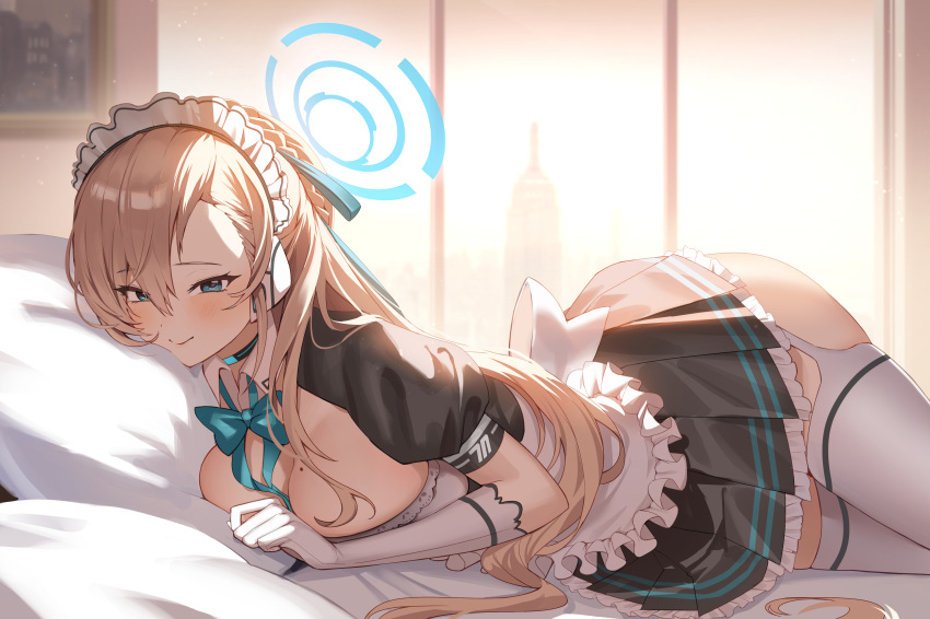 1girl absurdres apron asuna_(blue_archive) black_dress blue_archive blue_eyes breasts choker cleavage dress elbow_gloves empire_state_building frilled_apron frills gloves halo highres large_breasts light_brown_hair long_hair looking_at_viewer lying maid_apron maid_headdress mashilemo mole mole_on_breast new_york on_bed on_stomach smile solo thighhighs upper_body white_thighhighs
