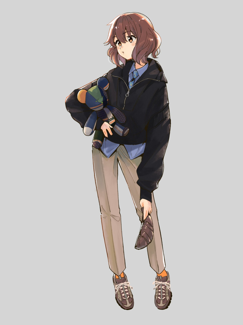 1girl bangs black_jacket blush bonryuu brown_eyes brown_footwear brown_hair grey_background hibike!_euphonium highres holding holding_stuffed_toy jacket khakis long_sleeves oumae_kumiko parted_lips shoes short_hair simple_background sneakers solo standing stuffed_animal stuffed_toy