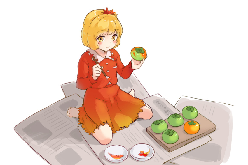 1girl aki_shizuha barefoot blonde_hair blush buttons closed_mouth food fruit hair_ornament holding holding_food holding_fruit holding_paintbrush itatatata leaf_hair_ornament long_sleeves newspaper paintbrush persimmon red_shirt red_skirt shirt short_hair simple_background skirt smile solo touhou white_background yellow_eyes