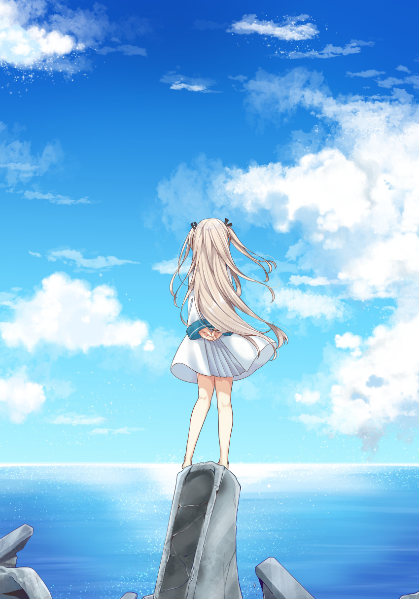 1girl absurdres arms_behind_back atri atri-my_dear_moments- barefoot black_ribbon blue_sky brown_hair cloud cloudy_sky commentary_request dress facing_away from_behind hair_ribbon highres horizon jako_(jakoo21) long_hair ocean outdoors pleated_dress ribbon sky solo standing two_side_up very_long_hair water white_dress