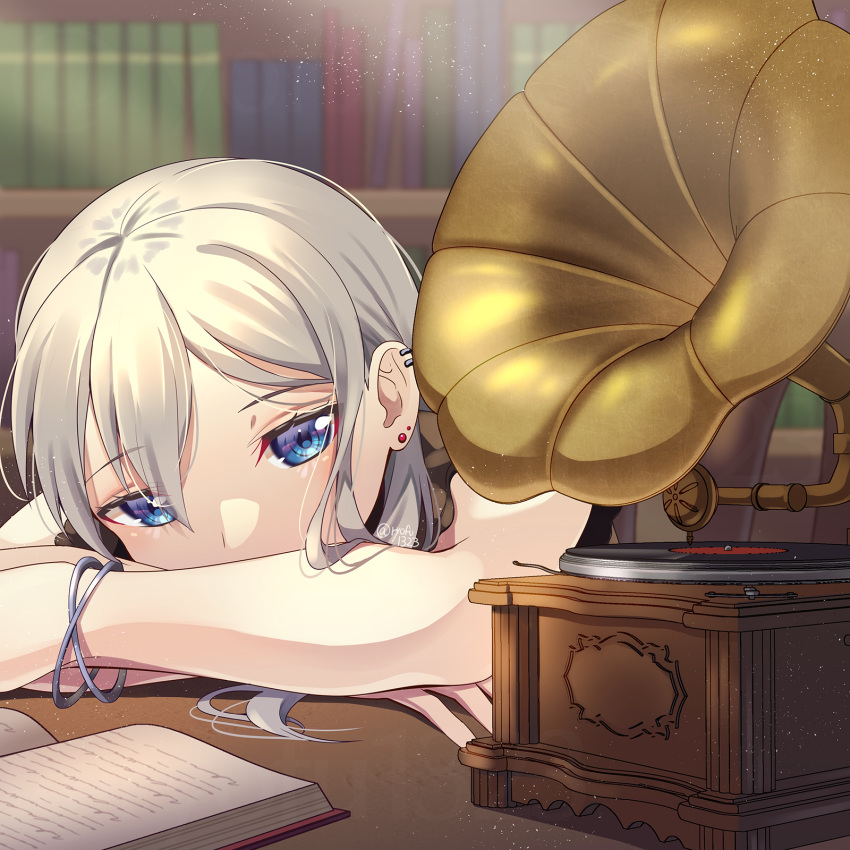 1girl blue_eyes book bookshelf earclip earrings grey_hair head_rest highres indoors jewelry long_hair looking_at_viewer open_book original phonograph ryofuhiko sitting solo stud_earrings wristband