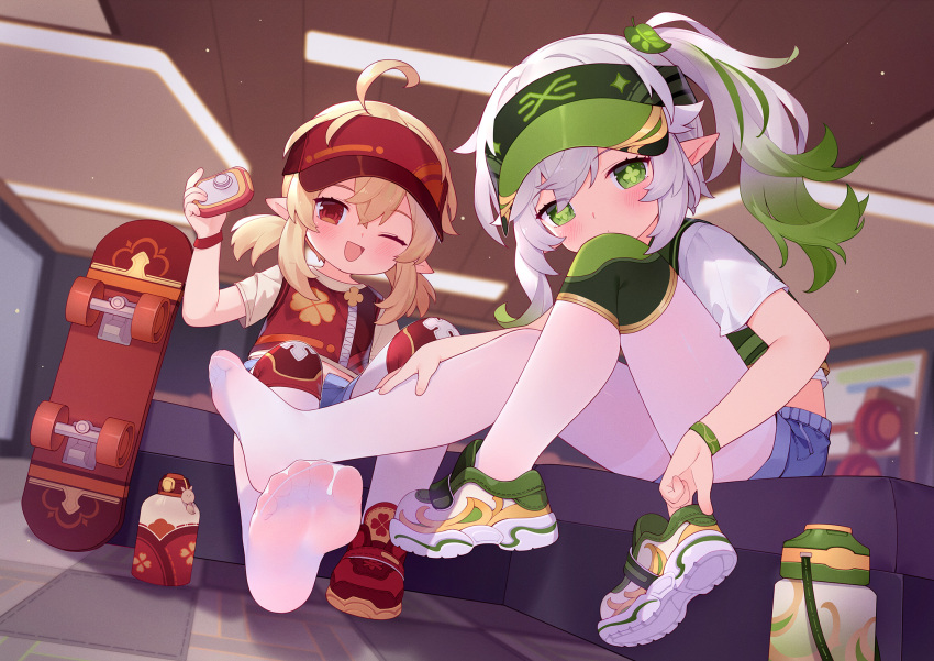 2girls ;d ahoge blonde_hair blue_shorts blush closed_mouth commentary_request contemporary cross-shaped_pupils genshin_impact gradient_hair green_eyes green_hair green_headwear green_vest highres holding indoors klee_(genshin_impact) knee_pads knee_up legwear_under_shorts long_hair looking_at_viewer low_twintails multicolored_hair multiple_girls nahida_(genshin_impact) one_eye_closed pantyhose red_eyes red_footwear red_headwear red_vest shirt shoes shoes_removed short_shorts short_sleeves shorts side_ponytail single_shoe sitting skateboard smile soles tsubasa_tsubasa twintails vest visor_cap white_footwear white_hair white_pantyhose white_shirt