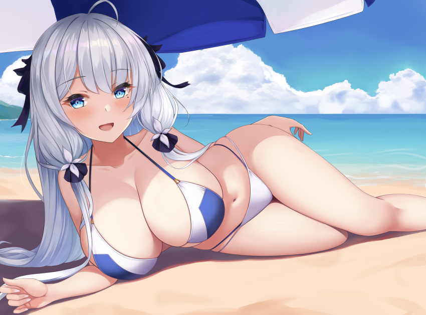 1girl alternate_costume azur_lane beach beach_umbrella bikini blue_bikini blue_eyes breasts day feet_out_of_frame hair_ribbon highres illustrious_(azur_lane) large_breasts long_hair looking_at_viewer lying navel on_side open_mouth outdoors ribbon shenqi_(toid310) skindentation solo summer swimsuit thighhighs two-tone_bikini umbrella very_long_hair water white_bikini white_hair