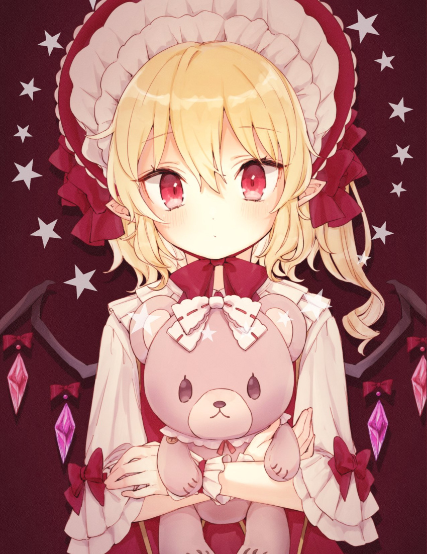 1girl blonde_hair blush bonnet crystal doll_hug flandre_scarlet highres honotai lolita_fashion looking_at_viewer object_hug one_side_up pointy_ears red_eyes simple_background solo star_(symbol) stuffed_animal stuffed_toy sweet_lolita teddy_bear touhou upper_body wavy_hair wings wrist_cuffs