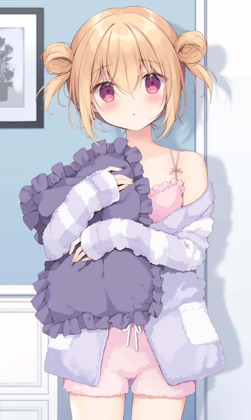 1girl blonde_hair blush bow breasts double_bun hair_bun highres holding indoors long_sleeves looking_at_viewer miyasaka_miyu object_hug off_shoulder original pajamas pillow pillow_hug pink_pajamas pink_shorts red_eyes shorts sleepwear small_breasts sweater