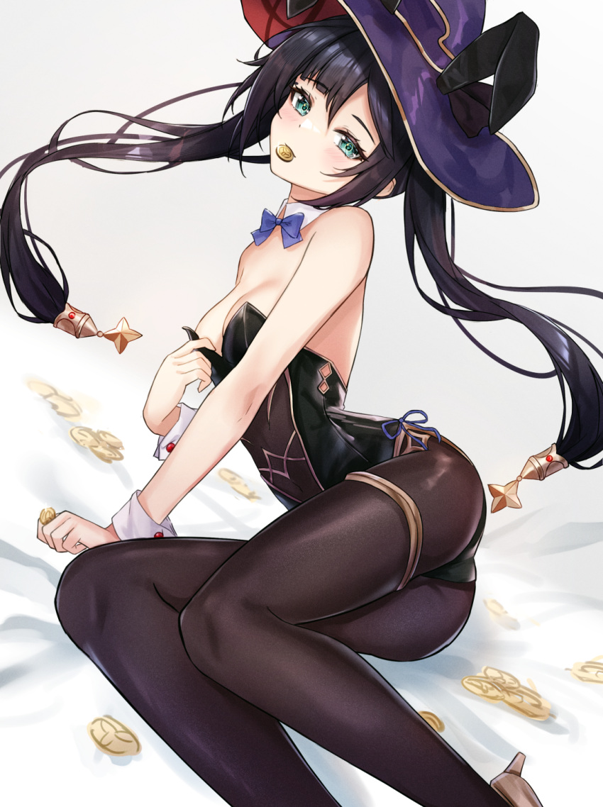 1girl adapted_costume ass atychi bare_shoulders black_hair black_leotard blue_bow blue_bowtie bow bowtie breasts brown_pantyhose coin feet_out_of_frame floating_hair genshin_impact gold_coin gold_trim green_eyes hat highres leotard long_hair lying medium_breasts mona_(genshin_impact) mora_(genshin_impact) mouth_hold on_side pantyhose playboy_bunny purple_headwear solo thighlet twintails witch_hat