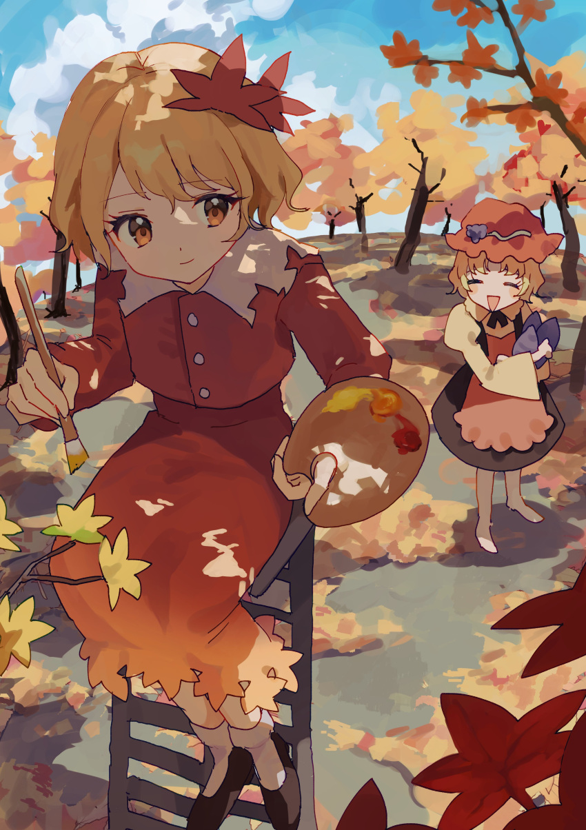 2girls :d absurdres aki_minoriko aki_shizuha apron autumn autumn_leaves bangs black_dress black_footwear blonde_hair blue_sky closed_eyes closed_mouth dress full_body hat highres holding holding_brush juliet_sleeves kozomezuki leaf leaf_on_head leaf_pile long_sleeves maple_leaf medium_hair mob_cap multiple_girls orange_apron orange_eyes outdoors painting_(action) palette_(object) puffy_sleeves red_headwear red_shirt red_skirt shirt shoes siblings sisters sitting skirt sky smile socks touhou tree white_socks