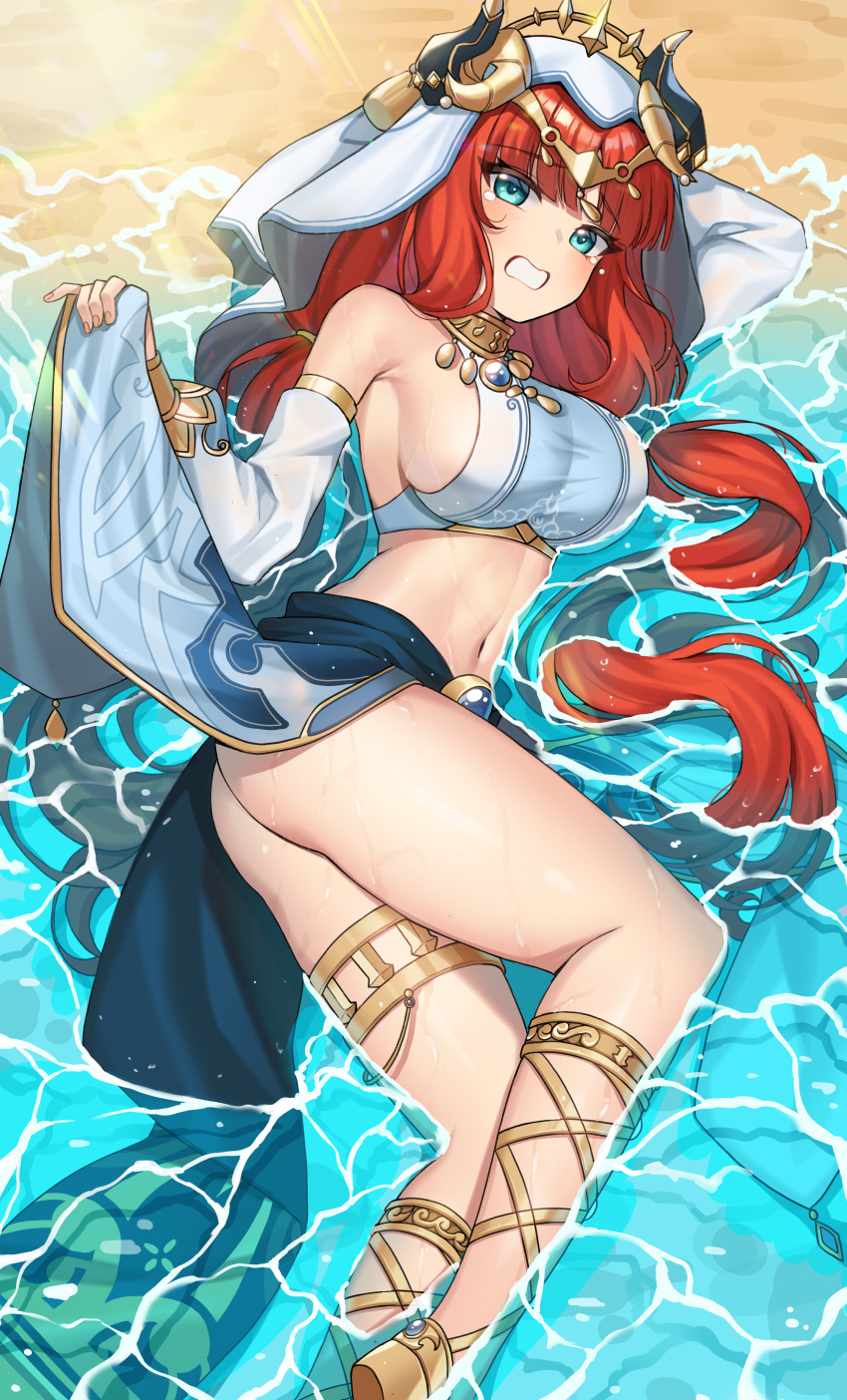 1girl absurdres arm_behind_head ass bangs barefoot beach blush breasts circlet clenched_teeth clothes_lift crop_top day detached_sleeves feet_out_of_frame genshin_impact gladiator_sandals harem_outfit highres horns long_hair long_sleeves looking_back lying medium_breasts nanni_jjang navel nilou_(genshin_impact) on_side outdoors red_hair sandals sideboob sidelocks skirt skirt_lift solo stomach tearing_up teeth thighlet thighs twintails veil water