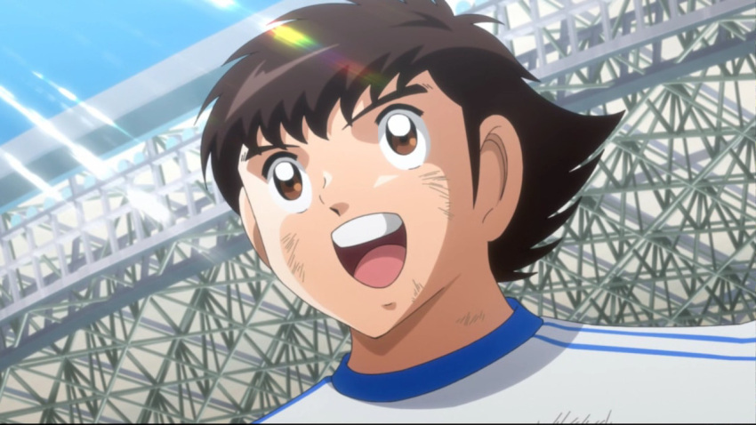 1boy brown_eyes brown_hair captain_tsubasa male_focus non-web_source oozora_tsubasa open_mouth smile soccer soccer_uniform solo solo_focus sportswear