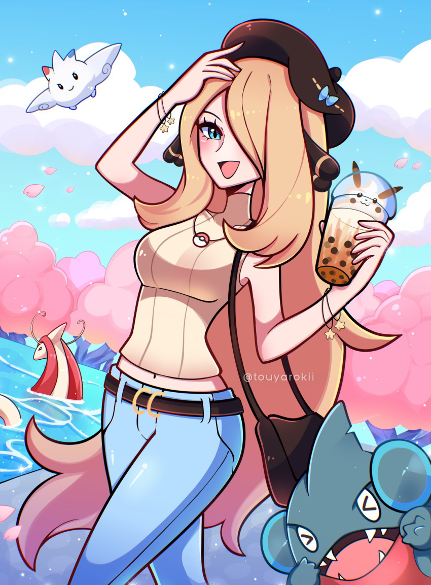 1girl blonde_hair blue_eyes cynthia_(pokemon) gible highres holding jewelry long_hair milotic open_mouth pokemon pokemon_(creature) smile touyarokii